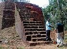 Officials conducting survey work at the Kasargod Fort premises.  dh photo