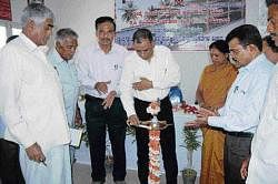 Zilla Panchayat Chief Executive Officer G V Rangarao inaugurating a seminar on mechanisation in sericulture, in Kolar on Tuesday. DH Photo