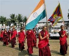 Tibetan activists in exile take part in a rally to mark the 51st anniversary of Tibetan Uprising Day at Salugara near Siliguri on Wednesday. PTI