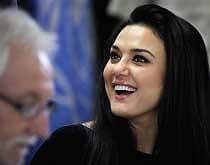 Bollywood actress Preity Zinta gestures during a news conference to announce her as the goodwill ambassador of the joint United Nations Program on HIV/AIDS (UNAIDS), in New Delhi on Thursday. AP