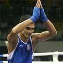 Indian boxer Jai Bhagwan reacts after beating Scotland's boxerJosh Taylor the quarterfinal bout in the Light weight 60 kg. category, during the 5th Commonwelth Boxing Championship in New Delhi on Sunday. PTI