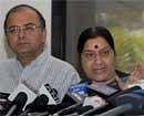 Senior BJP leader Sushma Swaraj with party leader Arun Jaitley addressing a press conference in New delhi on Wednesday. PTI