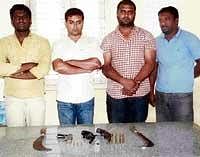 in police net: The four-member gang arrested by police. DH Photo