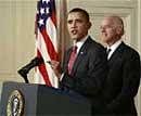 President Barack Obama, joined by Vice President Joe Biden, makes a statement to the nation Sunday night following the final vote in the House of Representatives for a comprehensive overhaul of the health care system, in the East Room of the White House in Washington. AP