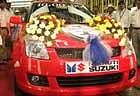 A Maruti Suzuki Swift car rolls out of an assembly line during an event at the Maruti Suzuki plant in Manesar, India, Tuesday, March 23, 2010. Maruti Suzuki rolled out the one millionth Maruti Suzuki vehicle in the fiscal year 2009-2010. (AP