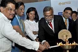 Maharashtra Sports Minister Suresh Shetty along with veteran athlete Pillavillakandi Thekeparamvil Usha, Krushnna Patil, the youngest woman to climb Mt. Everest, and Planning Commission Member Narendra Jadhav lighting the lamp during the inauguration of ''India International Sports Summit'' in Mumbai on Wednesday. PTI