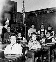 A 1958 photo shows Arthur Budzinski sitting in the second desk in his 3rd grade classroom at St Johns School for the Deaf in St Francis, Wisconsin. Budzinski, now 61, was one of about 200 deaf boys who say they were molested by Rev Lawrence Murphy decades ago. AP