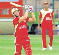 Towering hit : RCBs Cameron White practices at the  M Chinnaswamy stadium on Sunday. DH photo