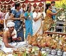 Devotees offering abhishekh to the idol of  Mahaveer on the occasion of Mahaveer Jayanthi in Bangalore  on Sunday. DH PHOTO