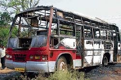 The remains of private bus which was burnt in Shimoga on Wednesday. DH Photo
