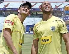 Deccan Chargers' skipper Adam Gilchrist with teammate Andrew Symonds. PTI