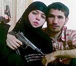 An undated and unlocated photo shows 17-year-old suicide bomber Dzhennet Abdurakhmanova posing with her husband Umalat Magomedov who was killed in 2009. AFP/NEWSTEAM
