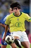 star power: Kaka (left) has not been at his best since his move to Real Madrid while coach Dunga doesnt want to pick Ronaldinho, who is in sparkling form this season .
