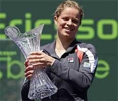 Kim Clijsters, of Belgium, holds the trophy after her 6-2, 6-1, win over Venus Williams, of the United States, in the women's singles championship match at the Sony Ericsson Open tennis tournament in Key Biscayne, Fla., Saturday,AP