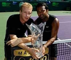 Lukas Dlouhy (L) of the Czech Republic and Leander Paes of India hold the trophy after defeating Mahesh Bhupathi of India and Max Mirnyi of Belarus to win the men's doubles final of the 2010 Sony Ericsson Open at Crandon Park Tennis Center on April 3, 2010 in Key Biscayne, Florida. AFP