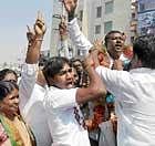 woman power Supporters celebrating victory of BJP candidate Sharadamma by garlanding her husband Ramanjaneya outside the counting centre at T Dasarahalli in Bangalore on Monday. DH photo