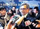 External Affairs Minister S M Krishna talks to reporters in Beijing on Tuesday. AP