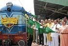 on track: Union Minister of State for Railways K H Muniyappa, along with MLA Shobha Karandlaje, Minister for Law and Parliamentary Affairs Suresh Kumar and MLA Dinesh Gundu Rao flagging off the special train from Yeshwantpur to Hosur on Tuesday. dh photo