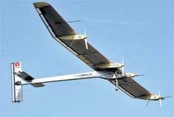 The solar powered aircraft flies for the first time with test pilot Markus Scherdel on board at the military airport in Payerne, Switzerland, on Wednesday. AP