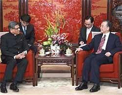 External Affairs Minister S M Krishna (left) meets with Chinese Premier Wen Jiabao in Beijing on Wednesday. Xinhua/AP