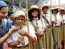Guiding Force: Students of Bishop Cotton Girls School during the inauguration of centenary celebration of World Guide Movement at Raj Bhavan in Bangalore on Saturday. DH Photo