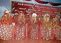 The brides who got married in the mass marriage conducted by Al-amin organisation in Madikeri on Sunday. DH Photo