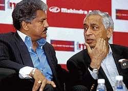 Mahindra Group MD Anand Mahindra (left) and Tech Mahindra Chief Executive Vineet Nayyar announcing the commencement of its SEZ at the Mahindra Satyam infocity campus in Hyderabad, on Tuesday. AP