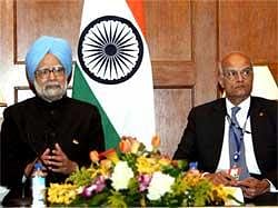 Prime Minister Manmohan Singh addressing a press conference at the Nuclear Security Summit in Washington on Tuesday. National Security Advisor Shiv Shankar Menon is also seen. PTI