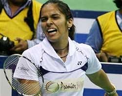 Indian player Saina Nehwal reacts after losing the first game during her semi-final match against Chinese player Xuerui Li at the Asian Badminton Championship in New Delhi on Saturday. Saina lost the match 17-21, 11-21. PTI