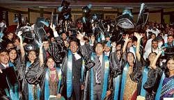 Students of St Johns National Academy of Health Sciences cheering at the Graduation Day celebrations in  Bangalore on Saturday. dh Photo