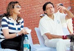 HAVING A BALL: Shashi Tharoor shares happy moments with Sunanda Pushkar at a friendly cricket match in Delhi last month.