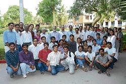 Students involved in the project posing for camera with the ISRO Chairman.