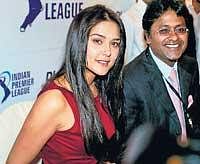 In this February 20, 2008, file photo Bollywood actor Preity Zinta with IPL chairman Lalit Modi  speak to journalists during the auction of cricket players. AP