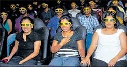 Thrilled: Visitors enjoying the 4D effect.