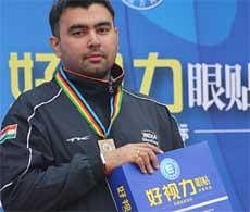 India's Gagan Narang during the medal ceremony in Beijing. IANS
