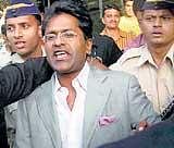 IPL Commissioner Lalit Modi arrives at the international airport in Mumbai on Tuesday. PTI