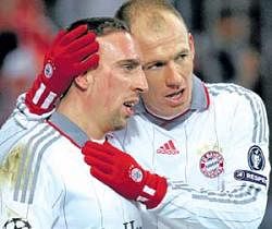 Awesome twosome: Bayern Munich need their two big guns Arjen Robben (right) and Franck Ribery fire from all  cylinders against Lyon in the Champions League semifinals to be held in Munich on Thursday. AFP