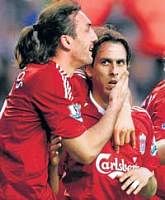 Well done mate!: Liverpools Yossi Benayoun (right) is congratulated by team-mate Sotirious Kyrgiakos after scoring against West Ham United on Monday. AP