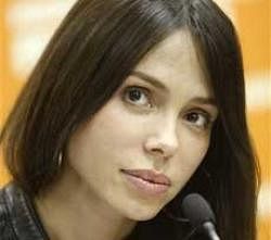 Russian-born singer, songwriter Oksana Grigorieva, talks during a news conference in Moscow, Monday,AP
