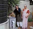 careful Gayatri and Shalini Pandit with their rainwater  harvesting unit. dh photo by kishor kumar