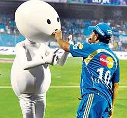 Aila! Sachin Tendulkar gets naughty with advertisement character ZooZoo in Mumbai on Wednesday night.PTI