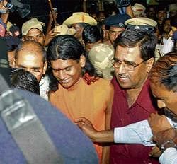 Nithyananda being brought to the City from Solan in Himachal Pradesh on Thursday. DH photo