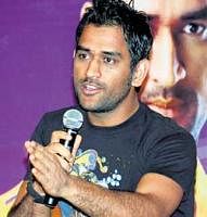 Captain cool:  Dhoni interacts with the media on Friday. PTI