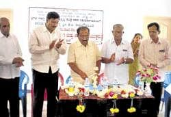 Legislator K P Bache Gowda inaugurating Arivu a programme to create awareness about  Suvarna Grama Yojane at Alagurki in Chikkaballapur taluk on Friday. Zilla Panchayat member G R Narayanaswamy and Taluk Panchayat Member K R Reddy are seen. DH PHOTO