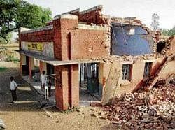 The Chianki railway station building in Jharkhand stands damaged in a Maoist attack last year. AP