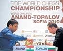 World champion Viswanathan Anand (left) makes a move against Bulgarias Veselin Topalov in the fourth game of the FIDE World Chess Championship in Sofia on Wednesday. AFP