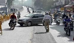 No rules: Traffic violation happens even as the cops look on.