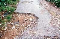 A view of the pathetic condition of Aldur-Hogar road in Chikmagalur. DH Photo