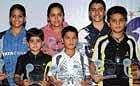 Champions: Winners of the State-ranking badminton tournament. BACK ROW: Mahima Agarwal (U-13 girls), Poorvisha S Ram (U-16 girls), Siddarth S (U-16 boys). FRONT ROW: Nikita Ramesh (U-10 girls), M Rohit (U-10 boys), Mithun Manjunath (U-13 boys). dh photo