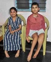 Sachin and his elder sister Supriya Shivapujimath of Dharwad, who are suffering from muscular dystrophy. DH Photo